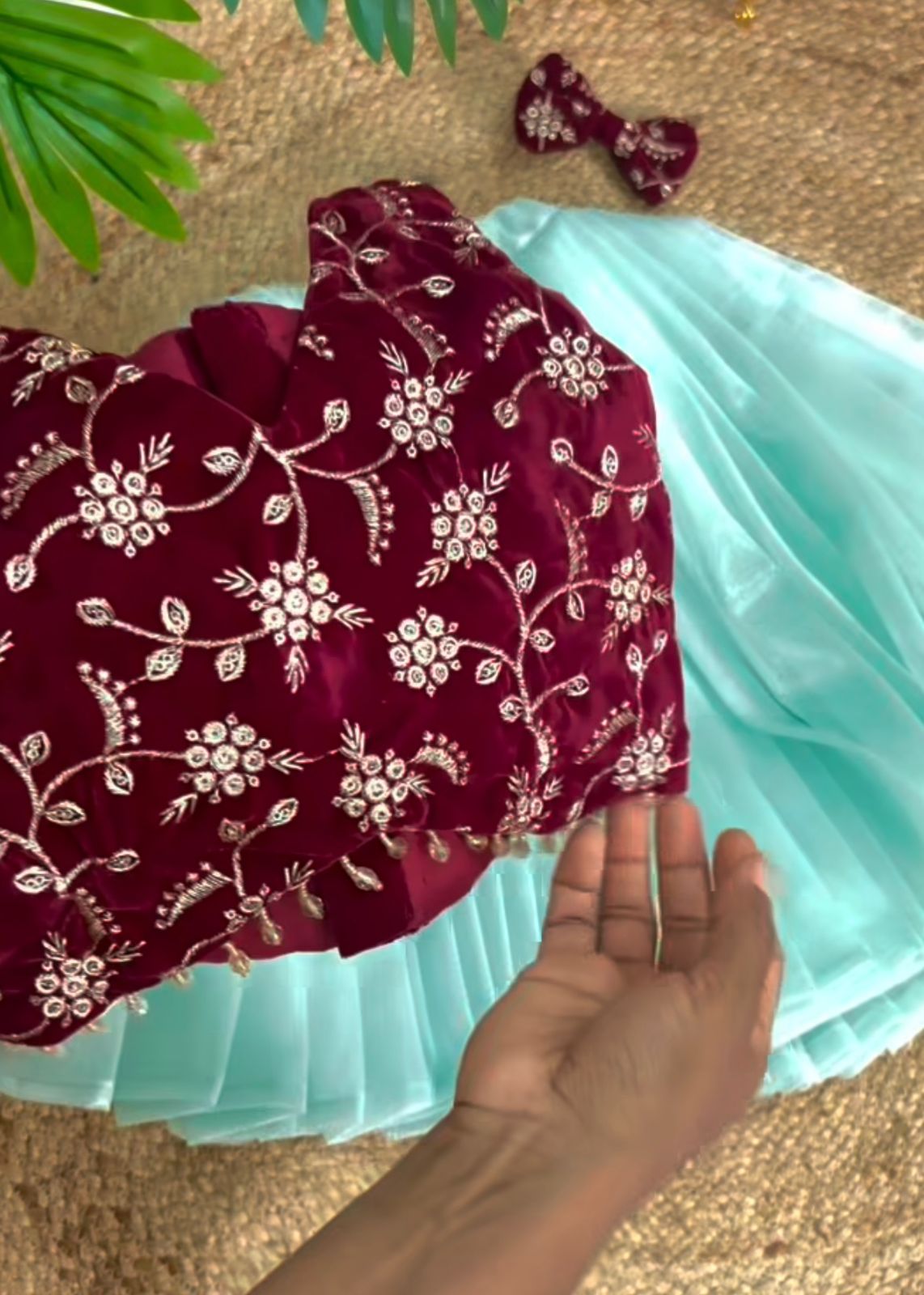 Festive Radiance: Girls' Maroon Velvet Floral Sequinned Top & Sky Twill Net Lehenga Set